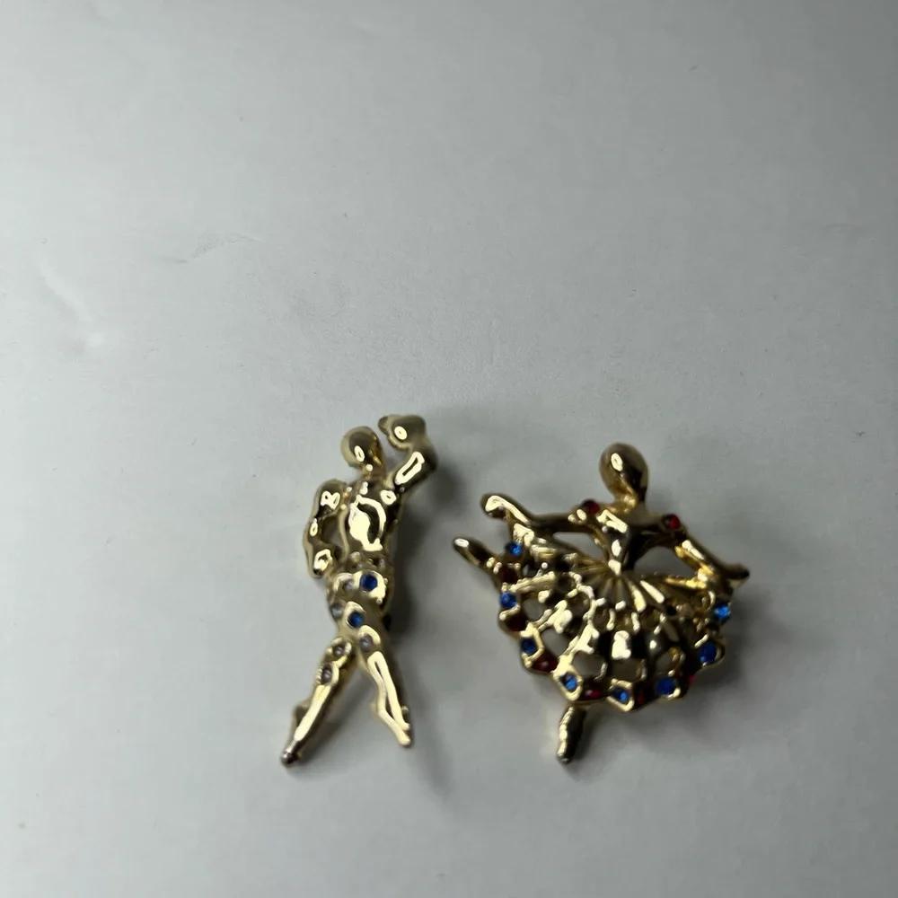 GOLD TONE AND RHINESTONE DANCING BROOCHES - MULTICOLOR DANCERS.‎